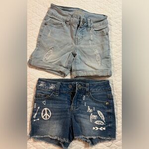 2 justice shorts , size 7 Slim